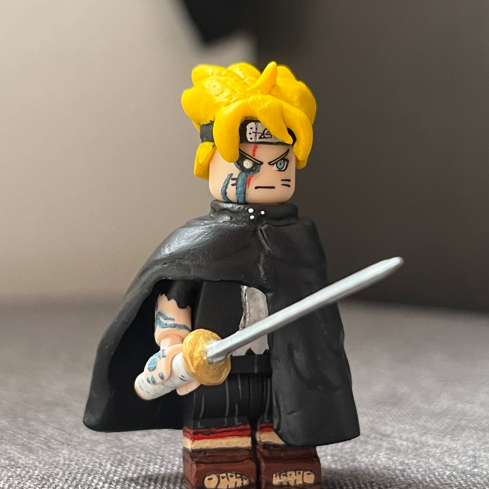 Minifigure Boruto Uzumaki phiên bản trưởng thành- bộ Anime Boruto- phụ kiện áo choàng papasuke- katana nam châm