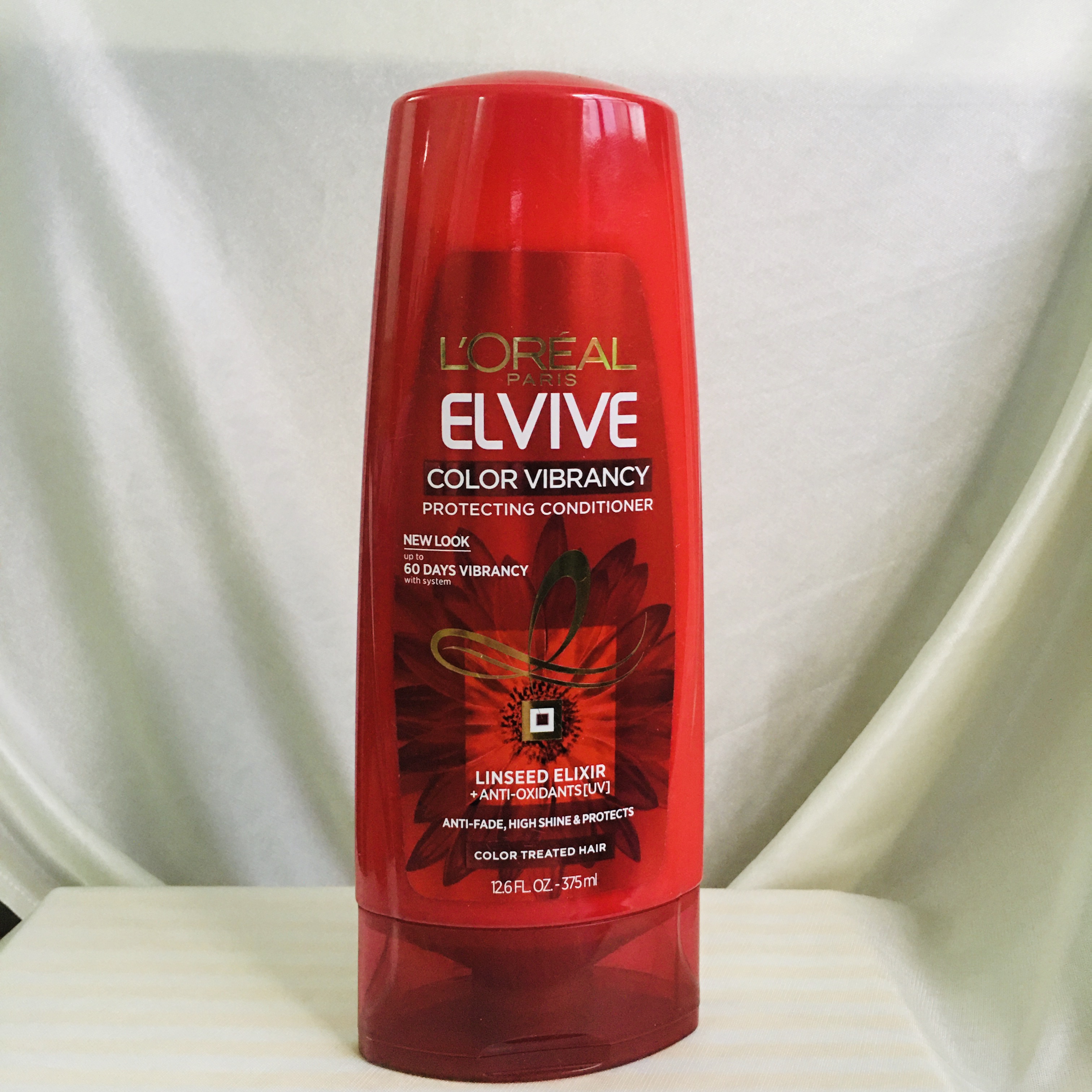 Dầu xả dành cho tóc nhuộm loreal elvive color vibrancy
