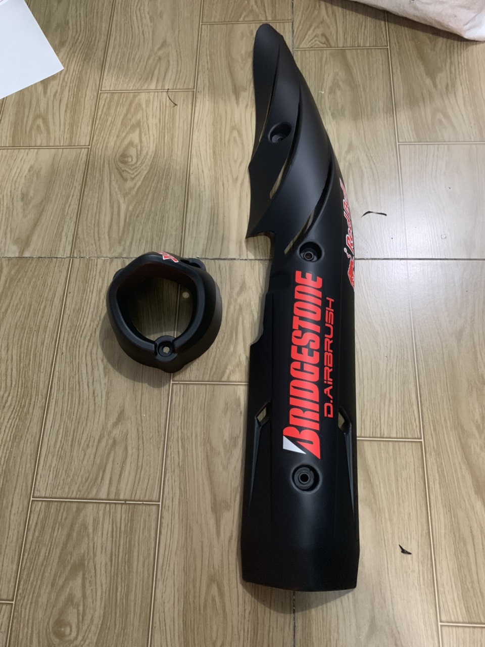 Ốp pô và chụp đích pô xe exciter 150 màu đen nhám