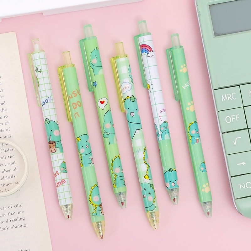 Bút bi bấm họa tiết khủng long xanh, bút bi gel mực đen cute có chặn ngòi