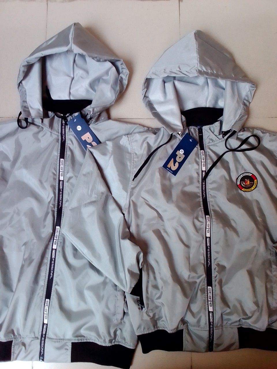 [HCM][A1] [ẢNH THẬT] Áo Khoác Gió Dù Cao Cấp Nam Nữ Nón Tháo Rời Khoát Hàng Hiệu 2 lớp Lót Thun - áo khoác nhẹ nam - áo khoác dù - áo khoát nam - áo khoát cặp đôi -  áo khoác cặp - áo khoác đôi - áo khoác dù - áo khoát nữ