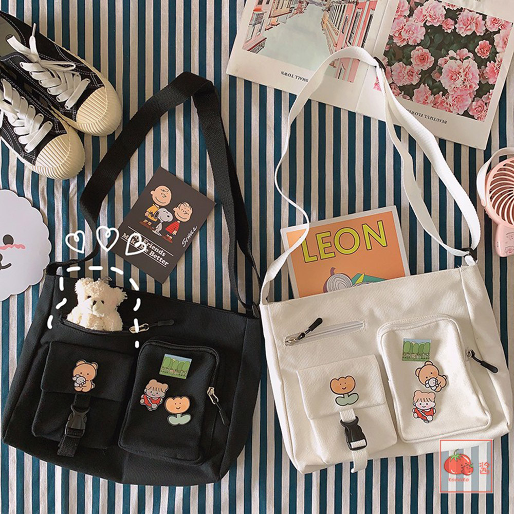 Túi đeo chéo nữ xinh đi chơi đi học thời trang unisex giá rẻ chất liệu canvas ngăn khóa rộng rãi dây đeo chắc chắn tiện lợi. Thế giới Balo Túi