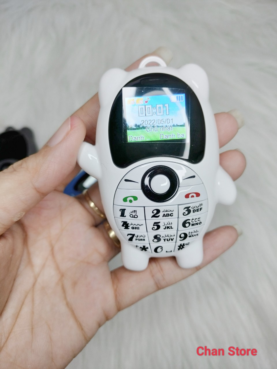 Điện thoại mini gấu k8 doreamon có dây đeo độc lạ đáng yêu 2 sim nghe gọi tốt