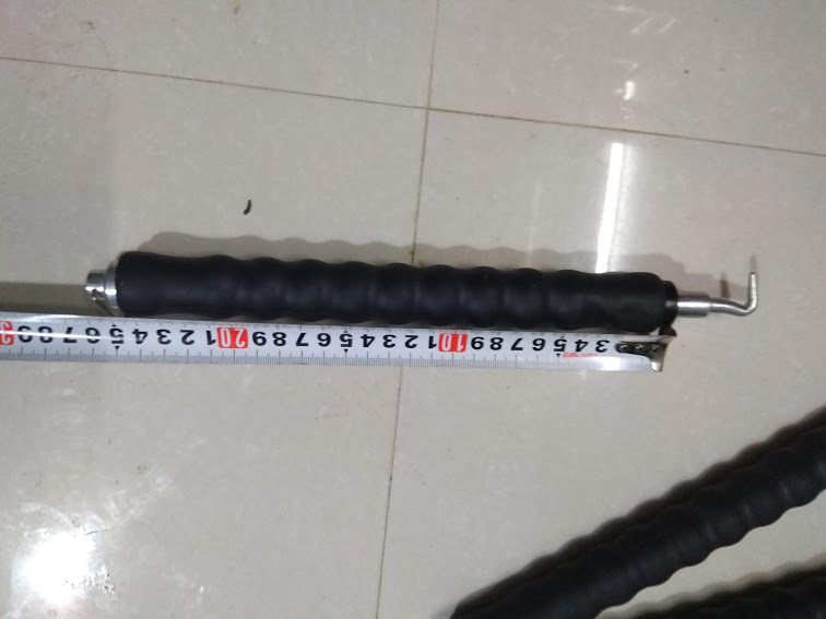 Móc xoay thép, móc buộc thép thông minh trong buộc thép ly xây dựng.