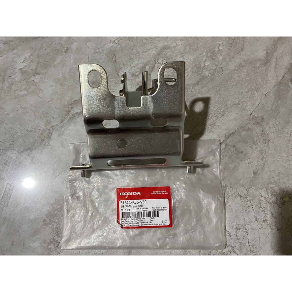 Giá đỡ đèn pha dưới honda winner x. 61311k56v50