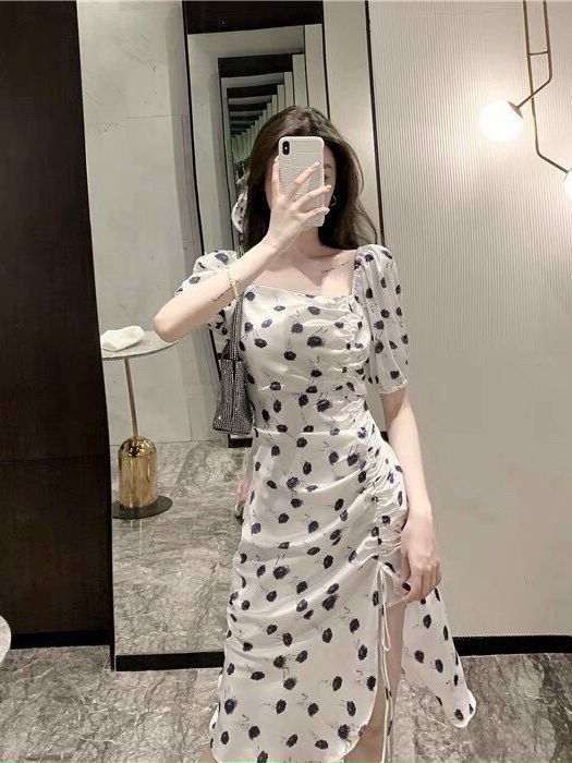 Đầm chấm bi xẻ tà tay búp quyến rũ sang trọng
