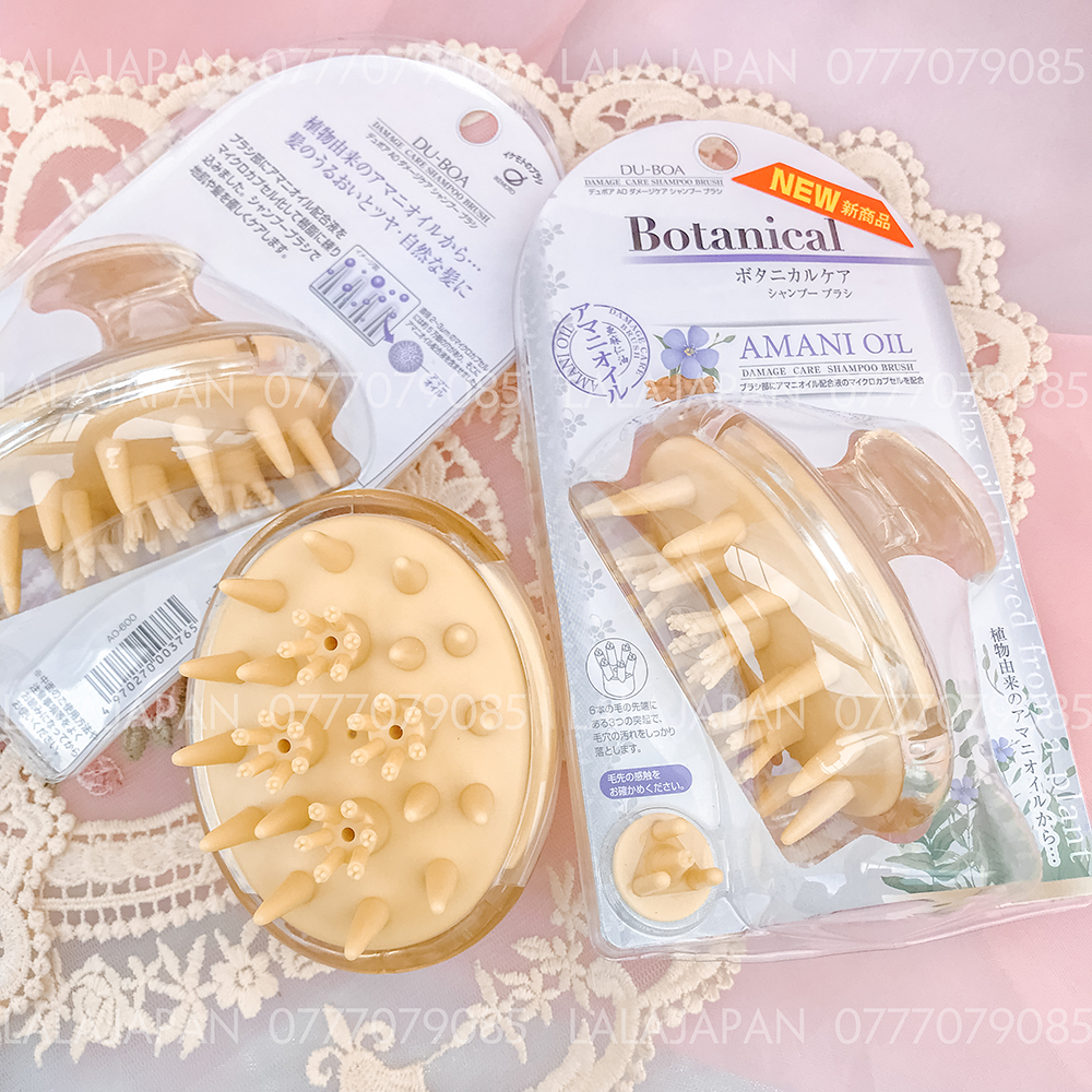 Lược gội đầu dưỡng sinh AMANI Nhật Bản có chứa tinh dầu thảo mộc giúp giảm rụng kích mọc tóc