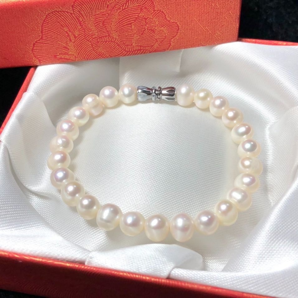 Vòng tay ngọc trai thật màu trắng tự nhiên - Đơn giản nhưng sang trọng (Bảo hành 2 năm) Tặng thêm khóa bạc và dây