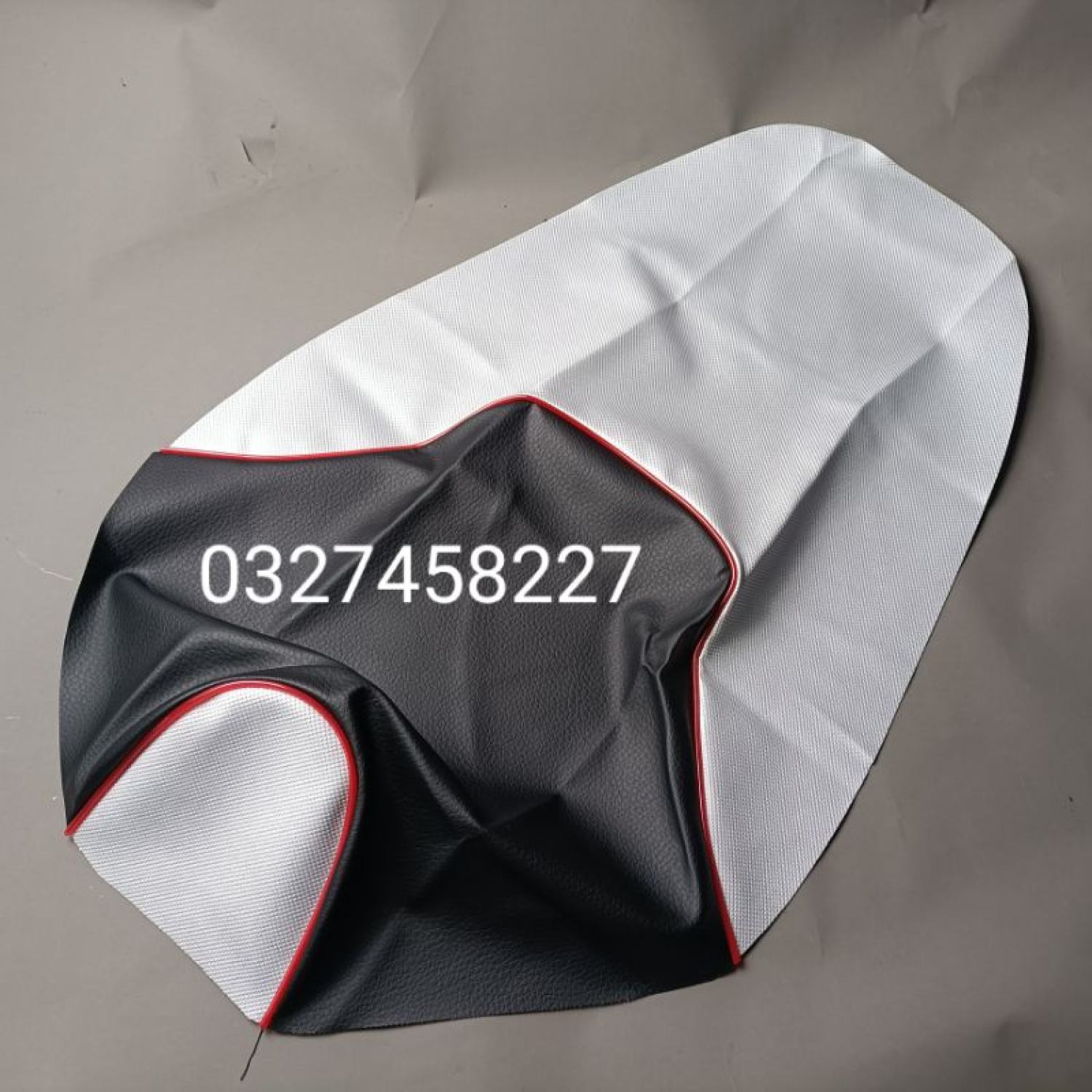 Trùm võ da bọc yên ngồi xe Exciter 2010 trắng đen , viền đỏ