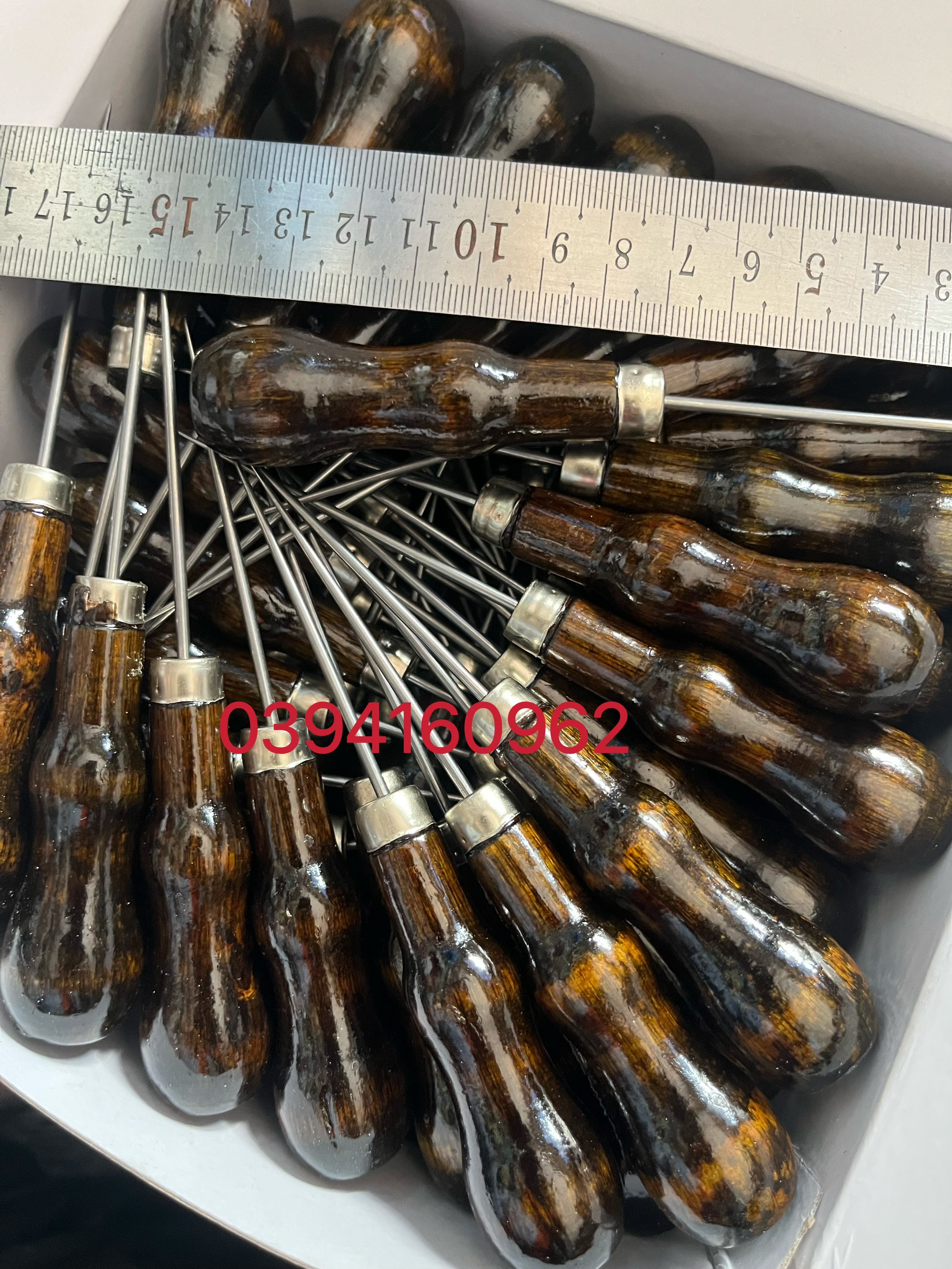Dùi vải cán gỗ