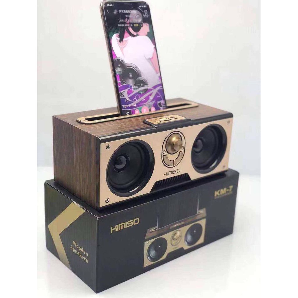 Loa Bluetooth Công Suất Lớn Kimiso - KM7 . Bluetooth 5.0 , Âm Bass Trầm Ấm , Hỗ Trợ FM/AUX/USB/TF/MIC , Thiết Kế Cổ Điển Vân Gỗ Cực Đẹp , Kiêm Giá Đỡ Điện Thoại Nhiều Chức Năng Cao Cấp