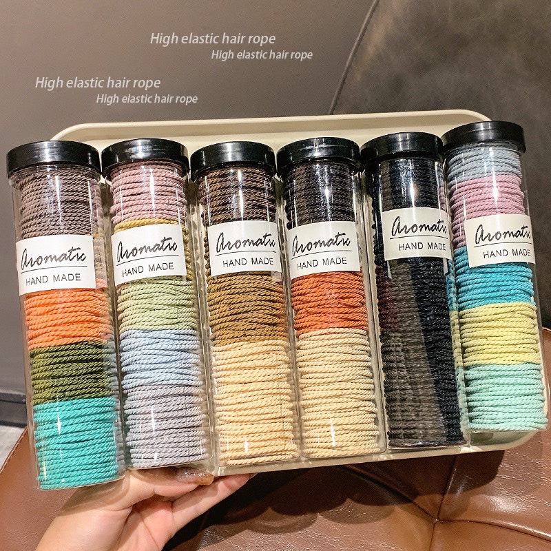 Set 100 dây buộc tóc co dãn tốt kèm hộp đựng