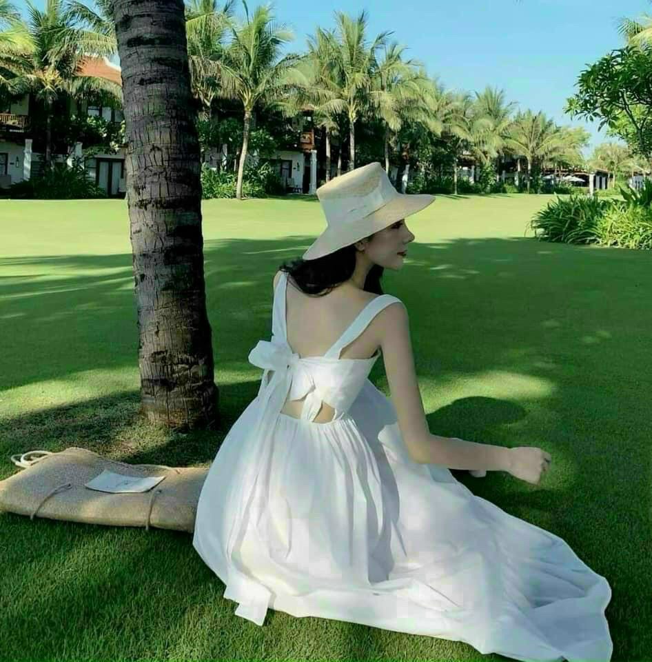 Đầm hai dây buột nơ lưng chất đũi dày dặn dáng xuông rộng siêu dễ thương m001911