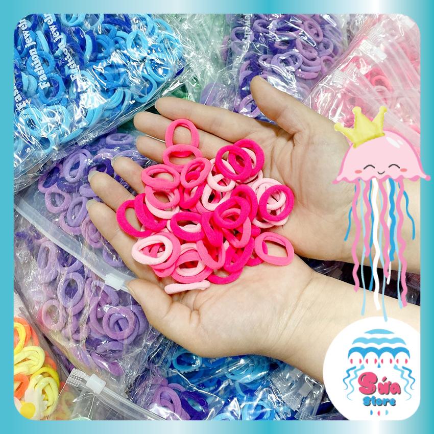 Set 50 chiếc chun buộc tóc nhiều màu co dãn tốt không đau tóc dễ thương cho bé gái tặng kèm túi zip tiện lợi dbt03