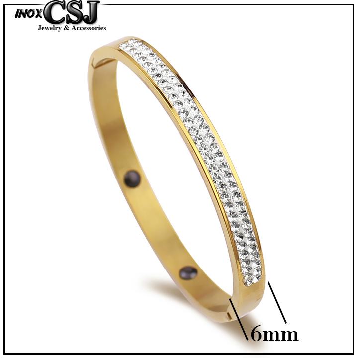 Vòng tay titan bảng trung to 2 hàng xoàn màu trắng , màu vàngtv014