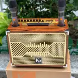 Loa karaoke xách tay KP P08, Đỉnh Cao Âm Thanh Cao Cấp Giá Rẻ, Tặng Kèm 2 Micro Không Dây, Kết Nối : Bluetooth. Usb, Thẻ Nhớ, Âm Trầm Sâu Mềm Nghe Nhạc Hay, Tiếng Micro Bay Nhẹ Hát Hay, Bảo Hành 1 Năm.