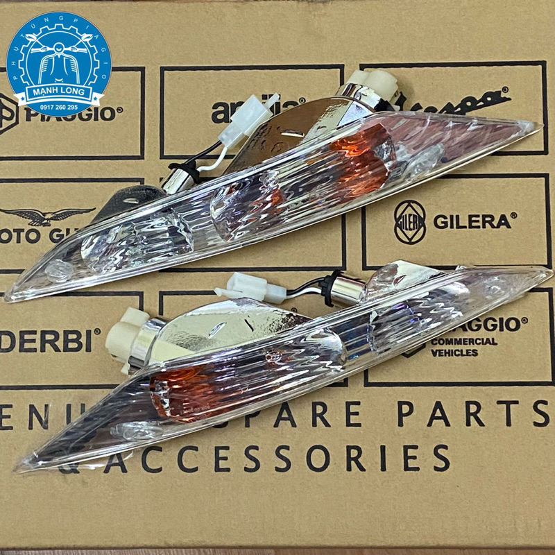 Cụm Xi nhan trước Piaggio Zip