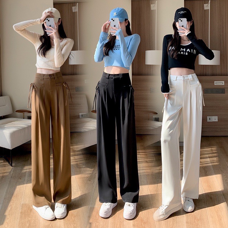 Quần ống suông, quần ống rộng lưng cao có 2 túi trước phong cách cá tính, dây thắt nơ 2 bên phong cách trẻ trung