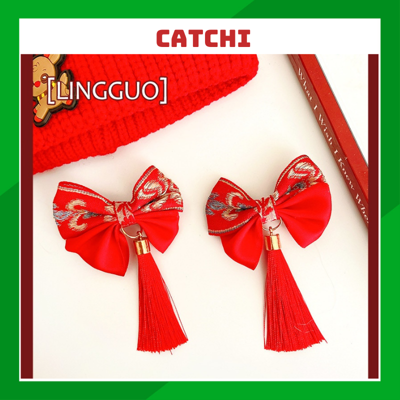 Nơ kẹp  tóc tết may mắn siu xinh cho bé Catchi (1 cặp)