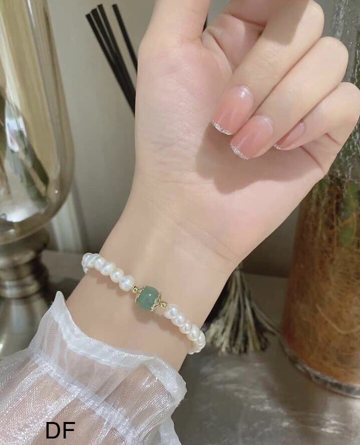 Lắc tay ngọc trai dây rút charm hạt ngọc bích phong thủy thanh lịch
