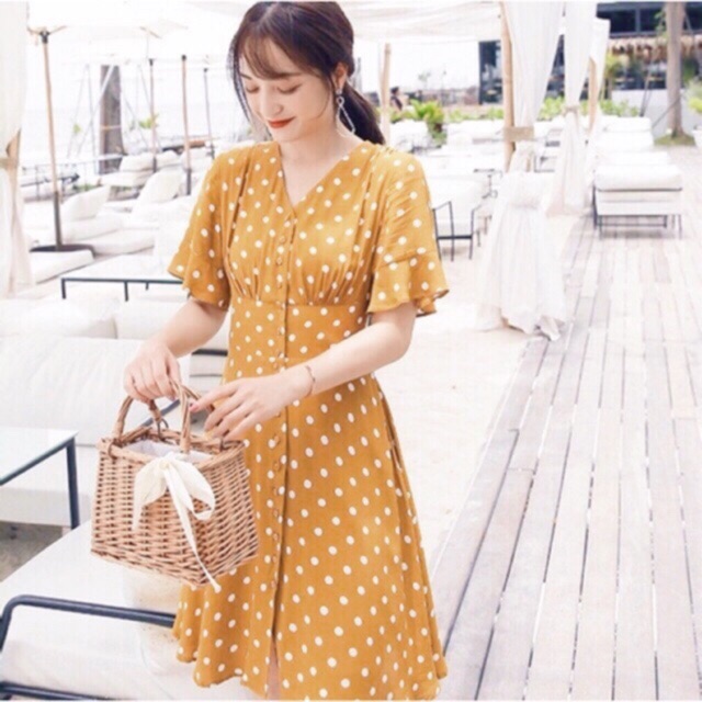 Đầm bi cam thun eo