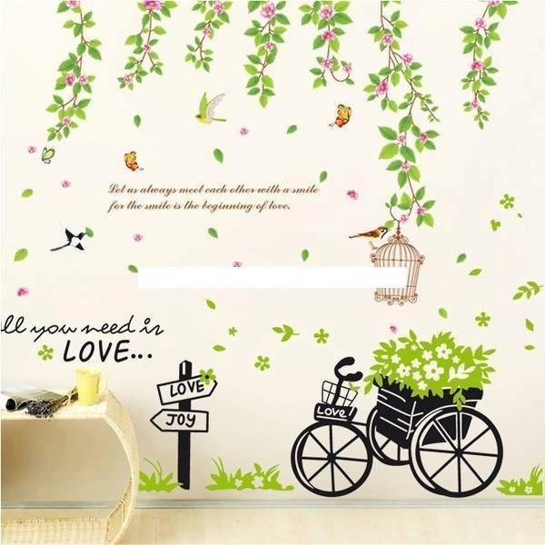 Decal dán tường dây leo hoa tầm xuân và xe đạp xanh