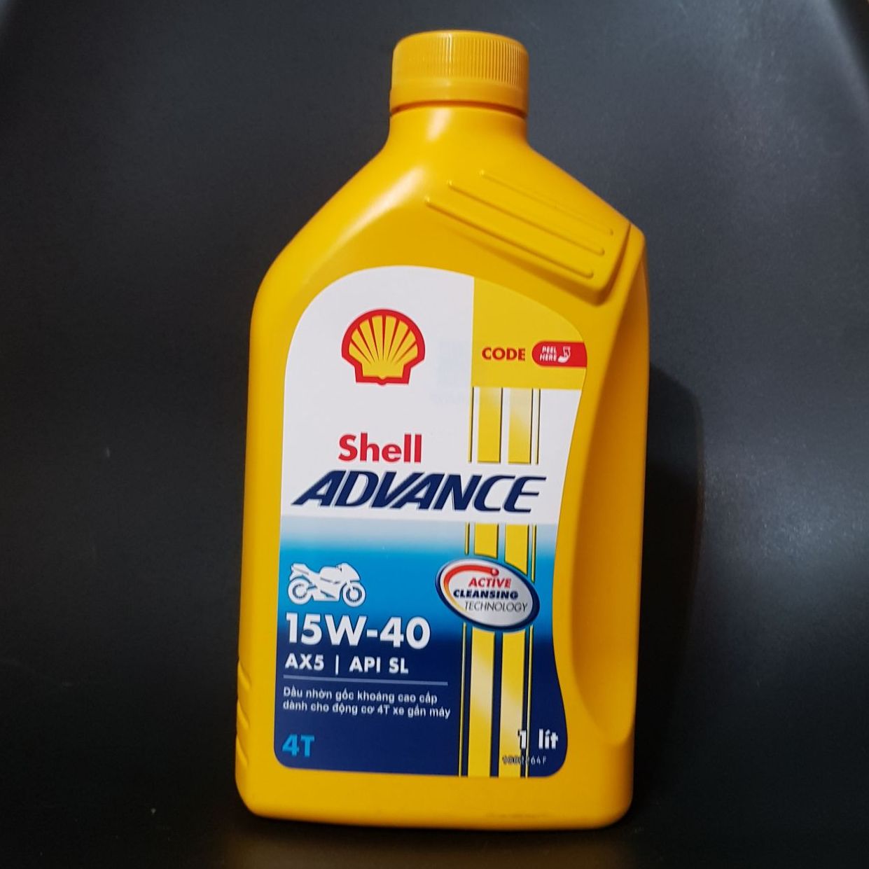 Nhớt xe máy shell Ax5 shell vàng chai 1L. Dầu động cơ xe máy 4T shell AX5 15W40 1L công nghệ hàng đầu tiết kiệm--