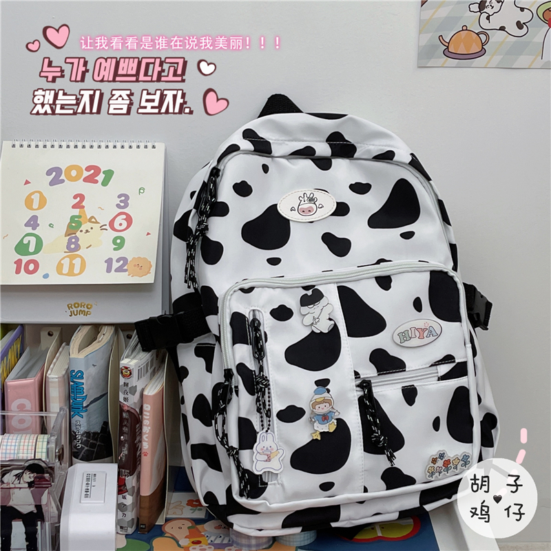 balo đi học họa tiết bò sữa. B173 họa tiết bò sữa trong suốt