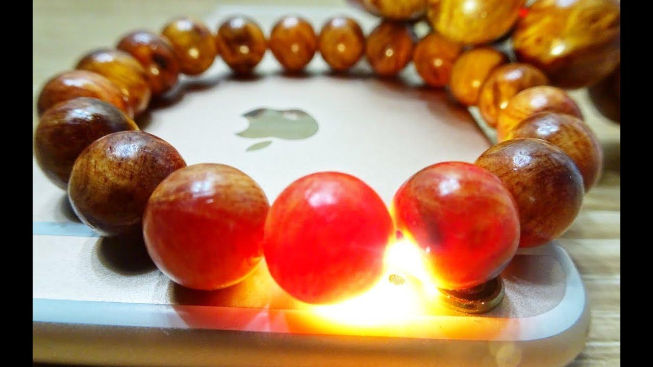 vồng đeo tay phong thủy gỗ huyết long hạt 14ly