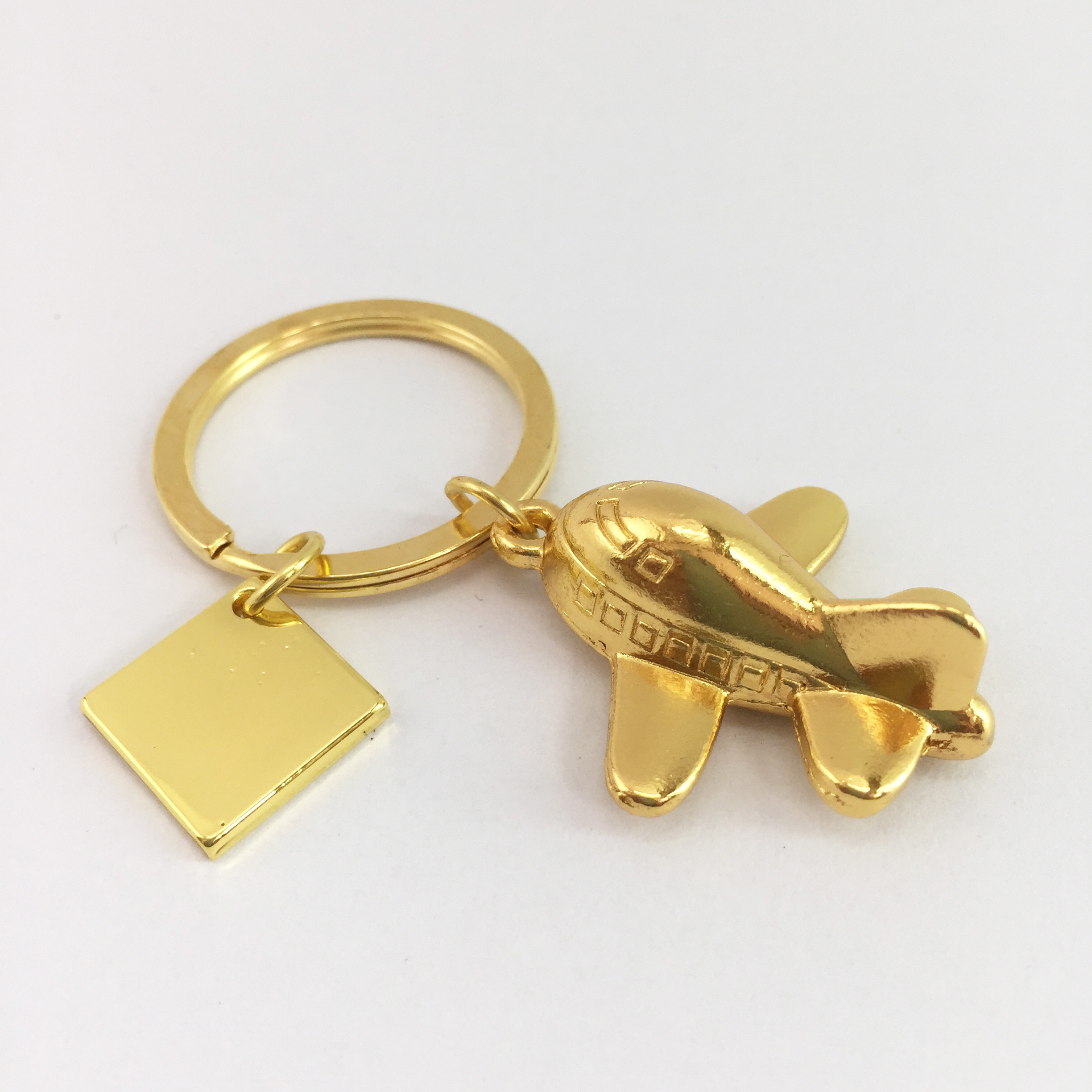 Móc khóa inox hình máy bay món quà nhỏ xinh mà ý nghĩa cho chùm chìa khóa thêm hấp dẫn, từ chìa khóa ô tô, xe máy, khóa nhà, khóa tủ đều trở nên đặc biệt - Màu vàng