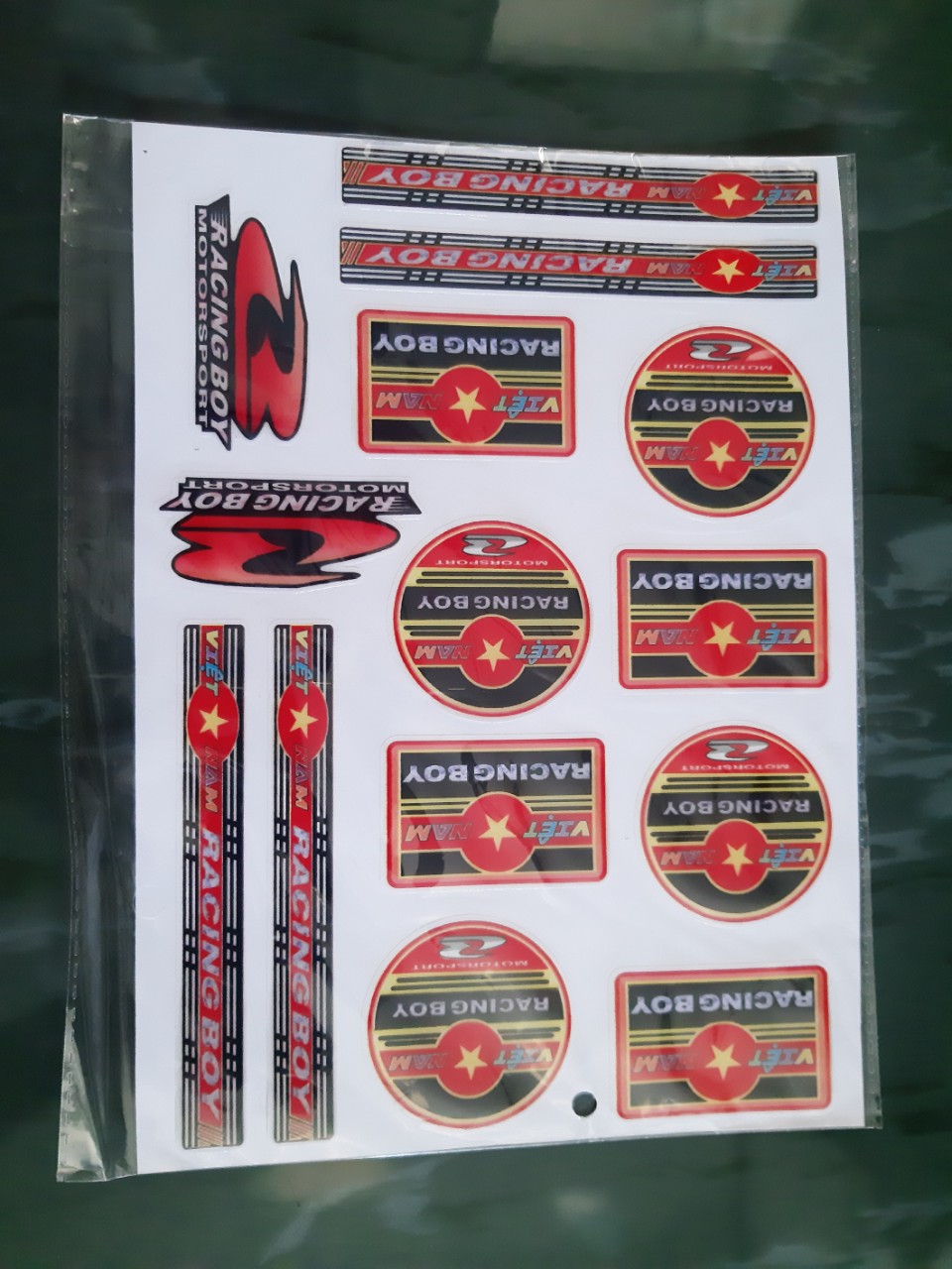TEM LOGO VIỆT NAM RACINGBOY VÀ NHIỀU TEM ĐA DẠNG KHÁC CÓ THỂ TRANG TRÍ XE,LAP TOP,ĐIỆN THOẠI,MŨ BẢO HIỂM ..V..V..