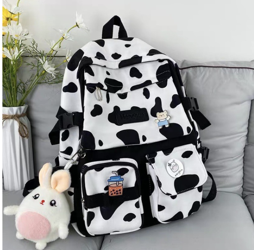 Cặp học sinh cấp 2 cấp 3 hoạ tiết bò sữa hàng cao cấp đựng vừa laptop 15inch