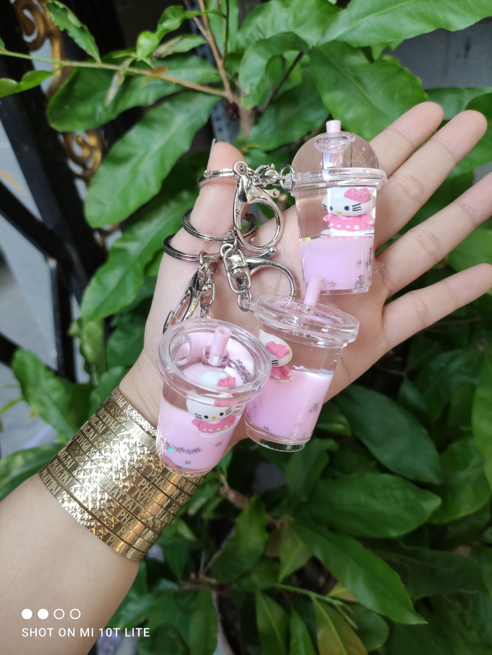 [HCM]móc khóa hello kitty chứa nước kim tuyến