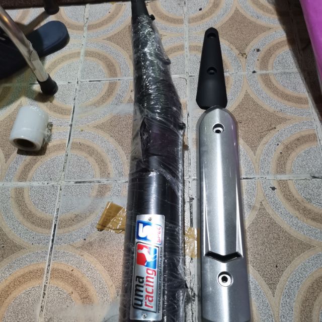 Trọn bộ pô Êm Uma Racing cho xe Sirius  kiểu spark tặng kèm bộ che pô