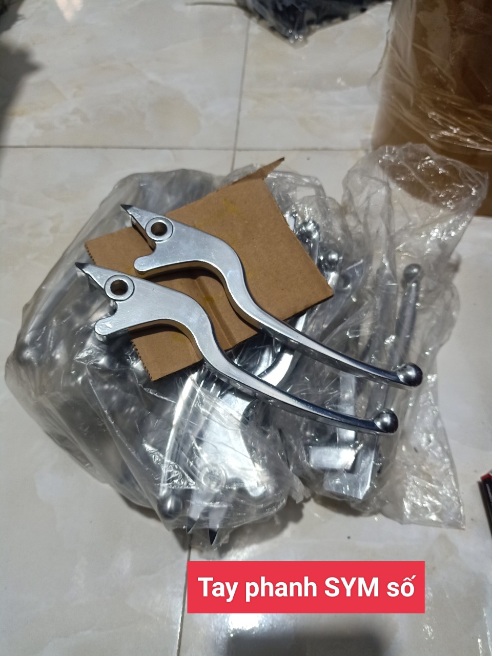 Tay thắng xe máy SYM số