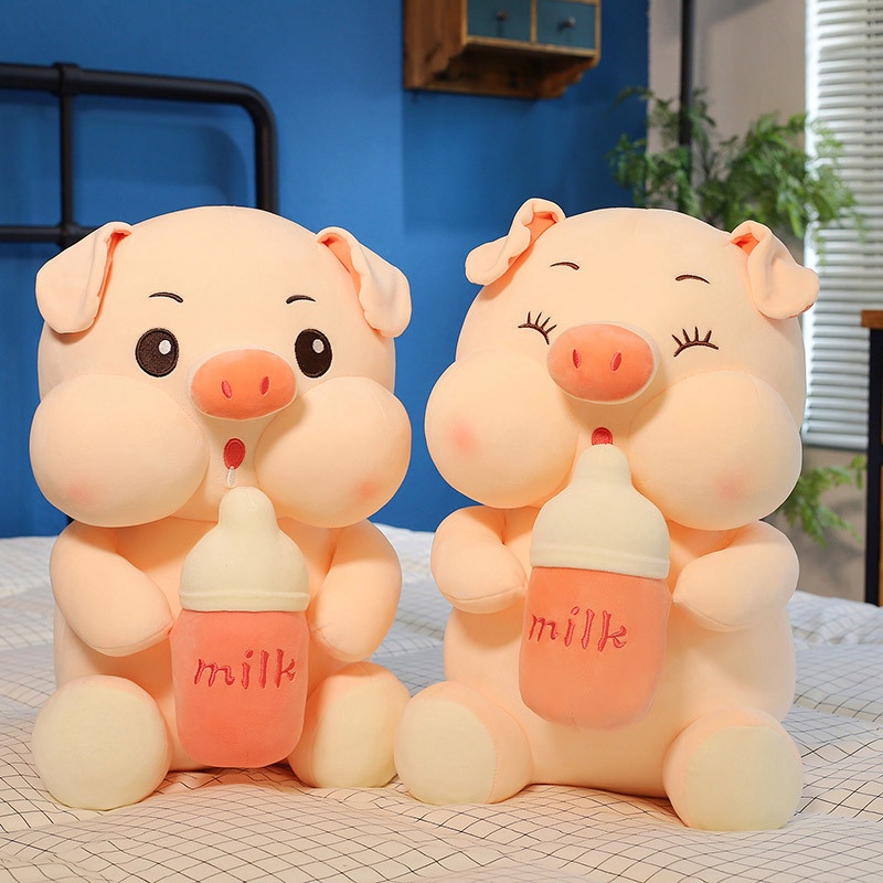 Gấu bông heo ôm bình sữa má phính , thú nhồi bông heo ôm bình sữa siêu dễ thương