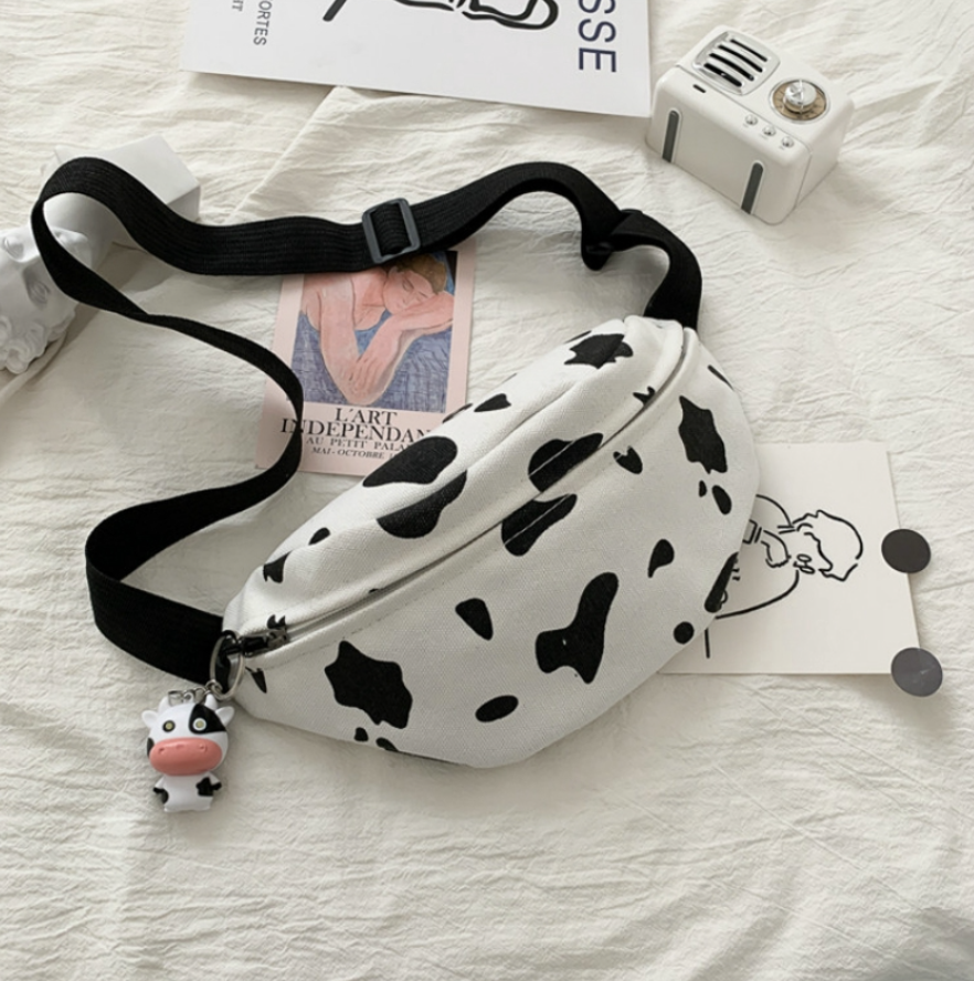 Túi đeo chéo bao tử unisex hoạ tiết bò sữa