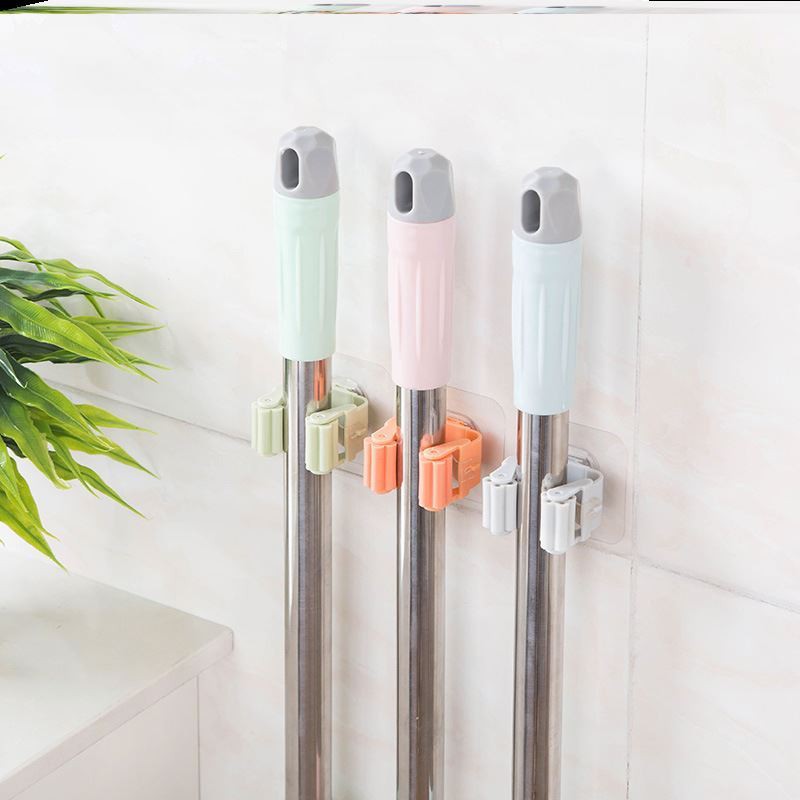 Kẹp cán chổi dán tường