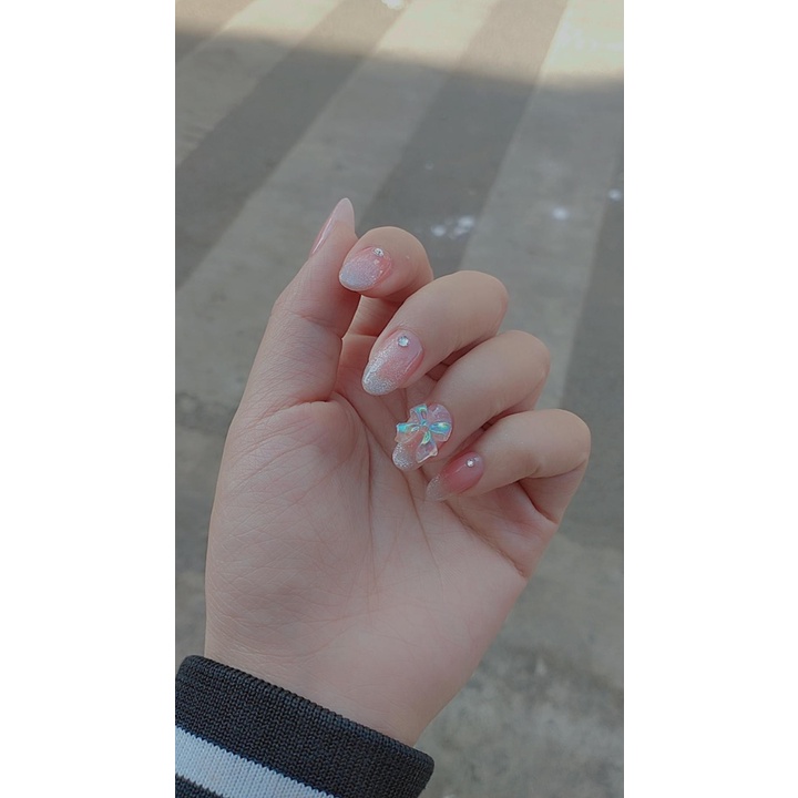 Móng úp thiết kế ven đầu móng lấp lánh, đính đá tròn xinh xắn kèm nơ cute P92
