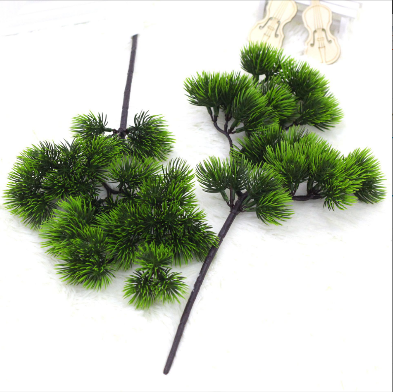 Cây giả-cành cây tùng nhựa pvc làm cây tùng trang trí