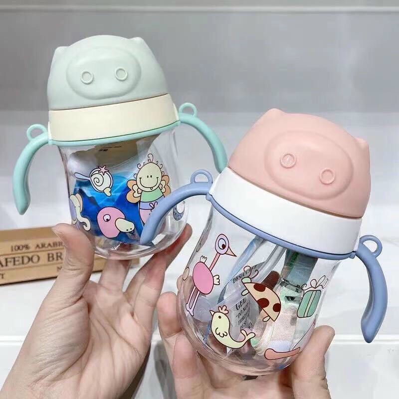 Bình tập uống nước tặng kèm dây đeo cho bé
