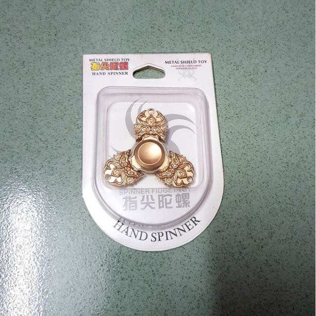 Con quay handspinner