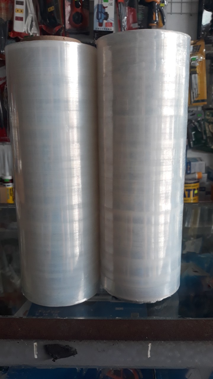 Hàng công ty mỏng - dai) Màng PE quấn hàng dài 25cm nặng 0.9kg, màng quấn hàng, màng quấn bụng Cửa Hàng Nam
