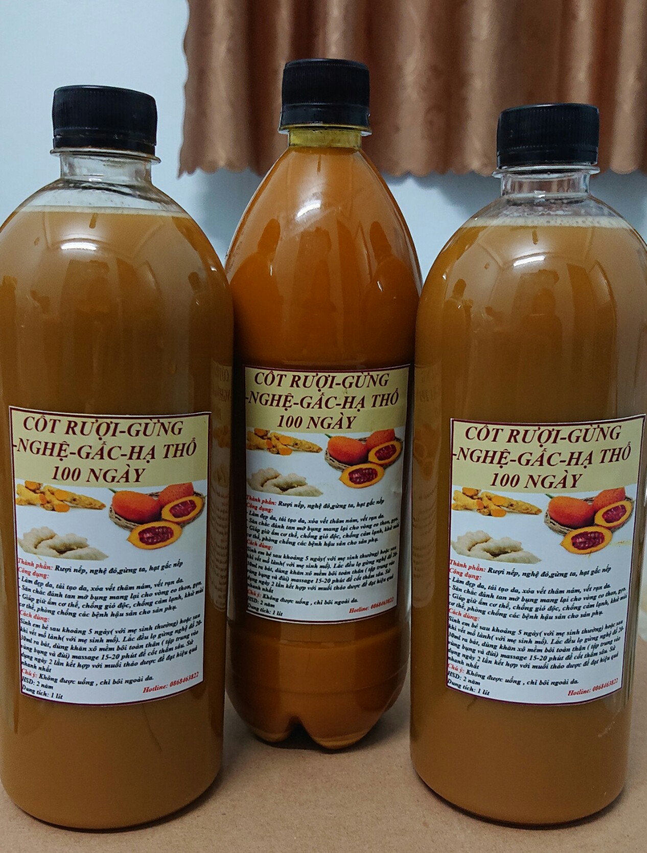 RƯỢU GỪNG NGHỆ HẠT GẤC HẠ THỔ 100 NGÀY DÙNG BÔI NGOÀI DA CHO PHỤ NỮ SAU SINH - BÍ QUYẾT EO THON, TRẮNG HỒNG