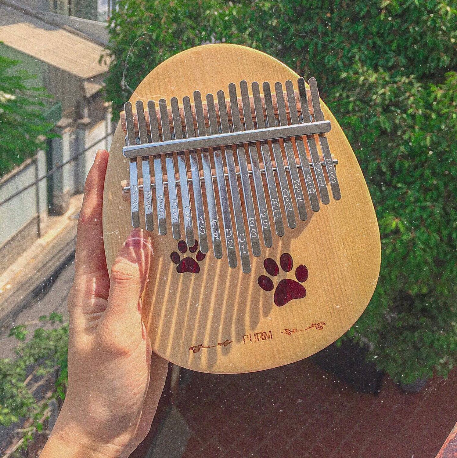 [HCM]Kalimba 17 phím gỗ nguyên khối mahagony PURM dấu chân chó