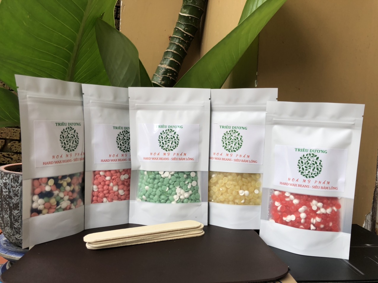 Sáp wax lông hạt đậu Triêu Dương 100gr - Tặng 2 que lấy sáp