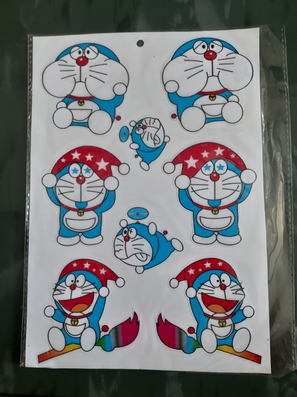 TEM DÁN DOREMON PHÙ THỦY HOẠT HÌNH,VUI NHỘN,CÓ THỂ DÁN XE,ĐIỆN THOẠI,LAPTOP,NÓN BẢO HIỂM,TÚI XÁCH...(CÓ NHIỀU SẢN PHẨM LOGO KHÁC)
