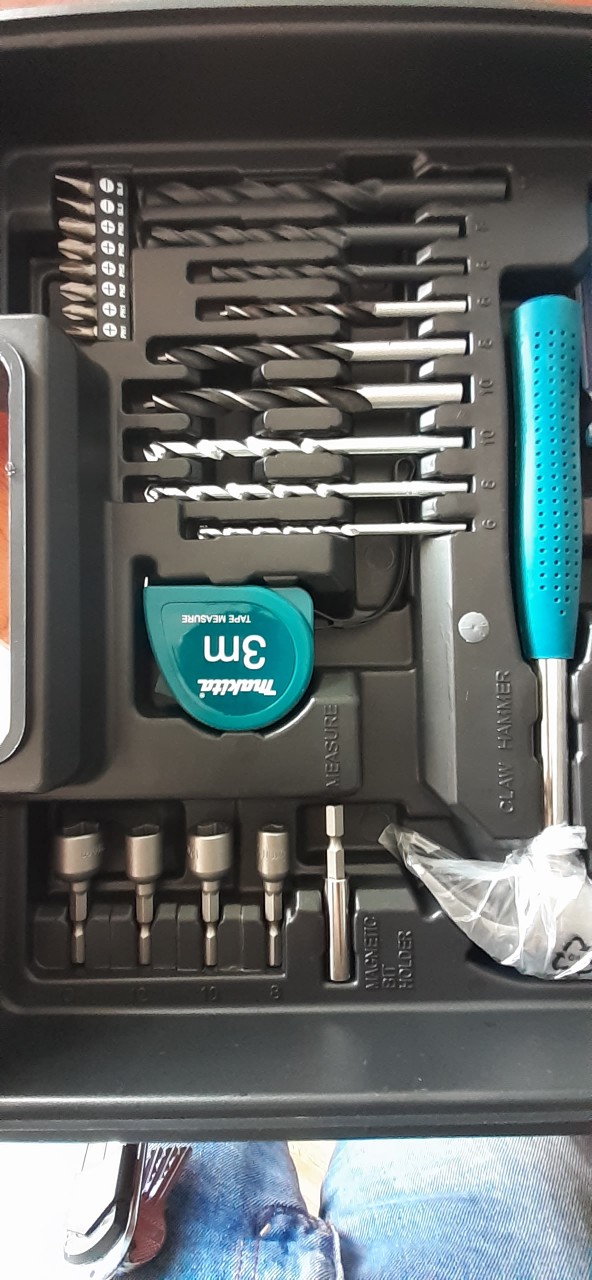 Máy khoan búa kèm bộ dụng cụ 26 món makita m8103kx2b