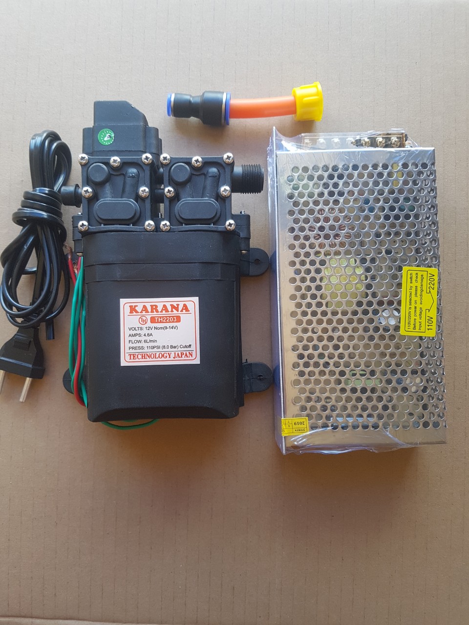 Bơm tăng áp. Bộ bơm đôi KARANA kèm nguồn tổ ong 12v-10a. tặng kèm nối đầu ra 8mm