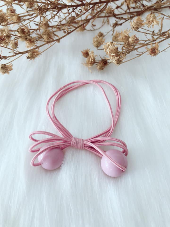 Set 2 chiếc cột tóc bòn bon, mẫu y hình, giao màu ngẫu nhiên.